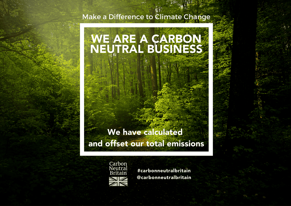 Text 'WE ARE A CARBON NEUTRAL BUSINESS' over a forest background, with 'Carbon Neutral Britain' logo and text about