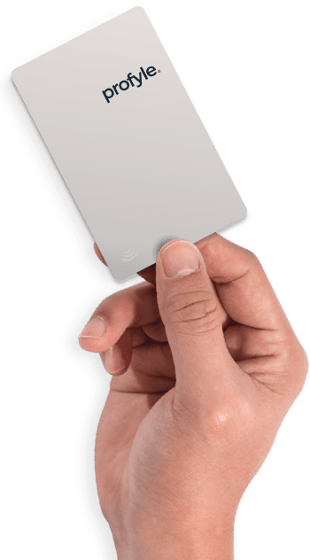 Hand holding a white card with 'profyle.' text and red dot