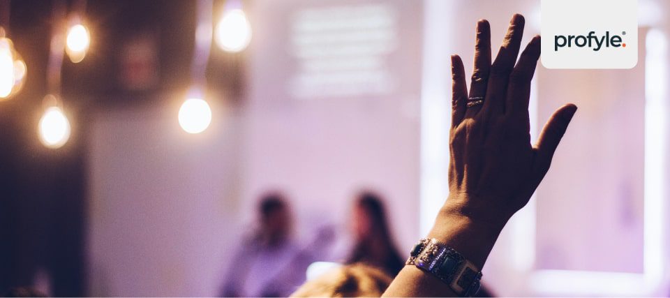 Raising your hand during a business event